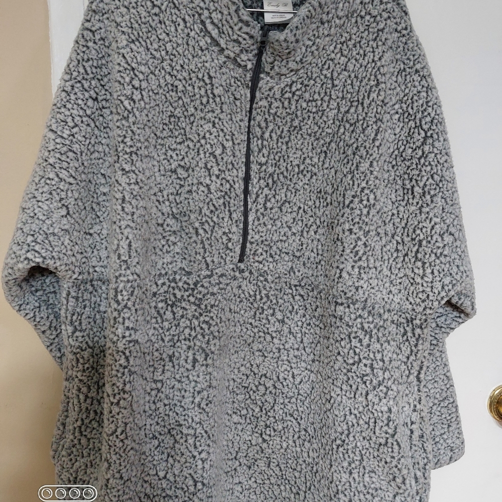 Gray and white warm sweater.